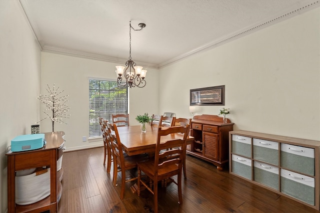 44 Westchester Dr, Conroe, TX 77304 - dining room with ornamental molding, a chandelier, and dark wood-style flooring