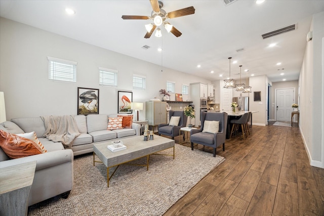 10407 Quiet Courtyard Rd, Houston, TX 77043 - living room with dark wood-style floors, ceiling fan, healthy amount of natural light, recessed lighting, and baseboards