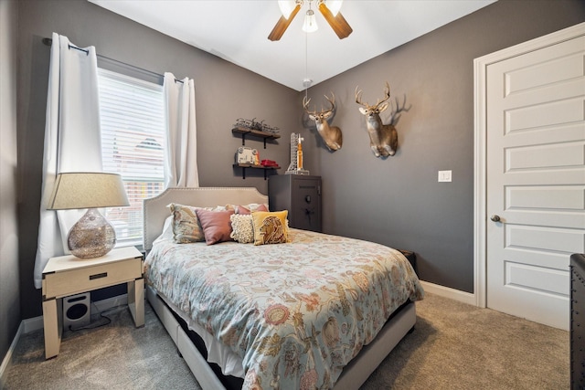 10407 Quiet Courtyard Rd, Houston, TX 77043 - bedroom with carpet flooring, baseboards, and a ceiling fan