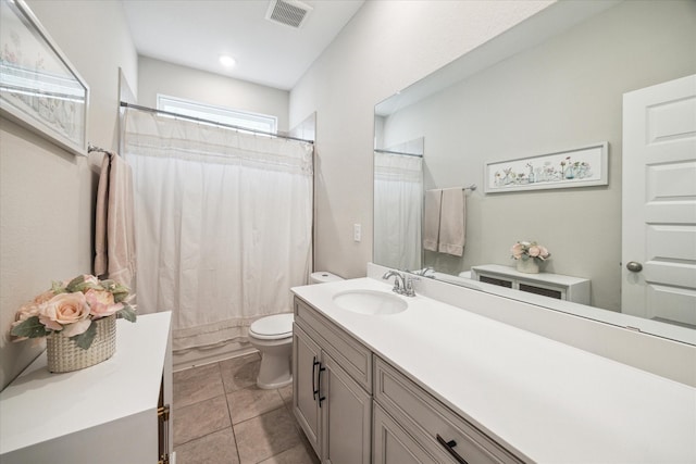 10407 Quiet Courtyard Rd, Houston, TX 77043 - bathroom featuring vanity, toilet, and tile patterned floors