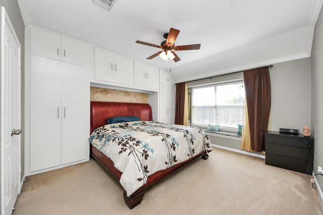 11126 E Lake Gables Dr, Richmond, TX 77406 - bedroom featuring light carpet, ceiling fan, crown molding, and baseboards