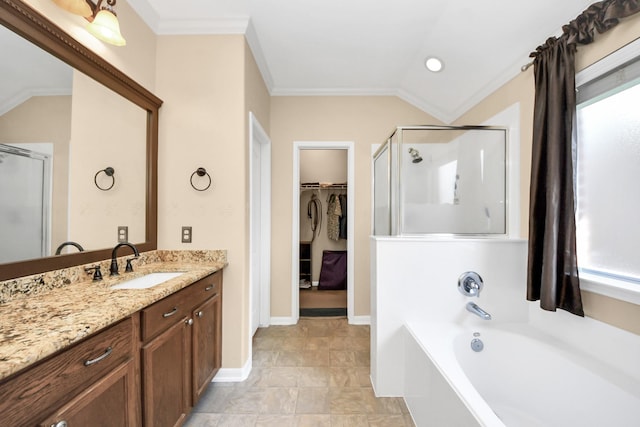 11126 E Lake Gables Dr, Richmond, TX 77406 - bathroom featuring a shower stall, lofted ceiling, vanity, crown molding, and a walk in closet