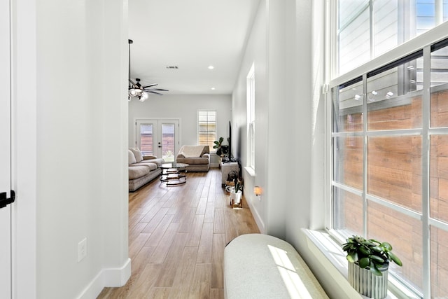 5209 Canal St, Houston, TX 77011 - corridor featuring light wood-type flooring, baseboards, and recessed lighting