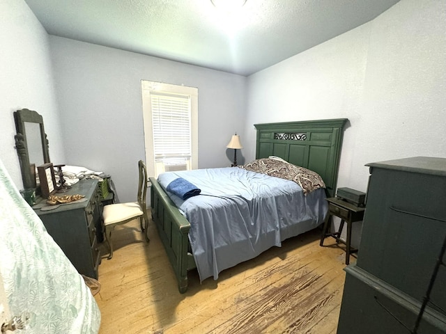 12215 Fm 442nd Rd, Boling, TX 77420 - bedroom featuring light wood-type flooring