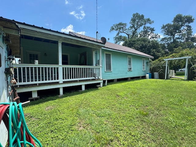 12215 Fm 442nd Rd, Boling, TX 77420 - view of side of property with a lawn and metal roof
