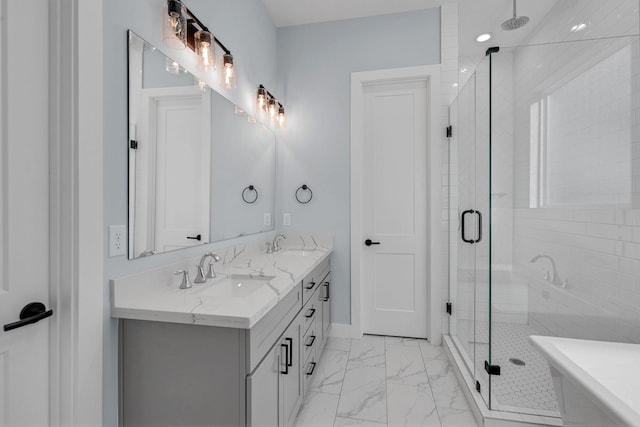 804 Woodcrest Dr Unit F, Houston, TX 77018 - bathroom with a stall shower, marble finish floors, a freestanding bath, double vanity, and baseboards