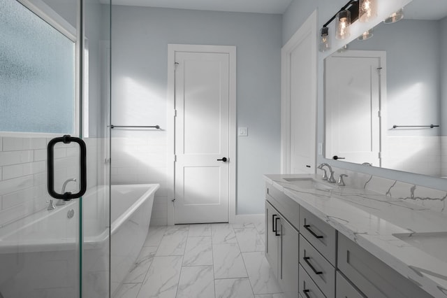 804 Woodcrest Dr Unit F, Houston, TX 77018 - full bath with marble finish floors, vanity, and a freestanding tub