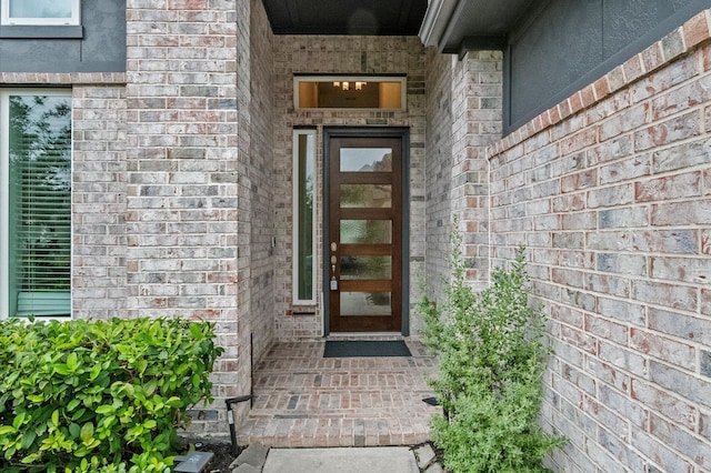 2824 Jehlon Ln, Conroe, TX 77385 - doorway to property featuring brick siding