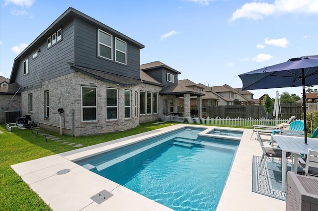 2824 Jehlon Ln, Conroe, TX 77385 - view of pool with a patio, central air condition unit, and a pool with connected hot tub