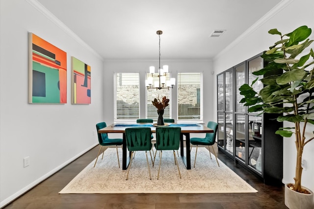 2824 Jehlon Ln, Conroe, TX 77385 - dining room with a chandelier, ornamental molding, baseboards, and dark wood-type flooring