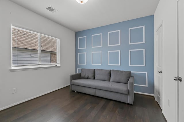2824 Jehlon Ln, Conroe, TX 77385 - sitting room featuring wood finished floors and baseboards
