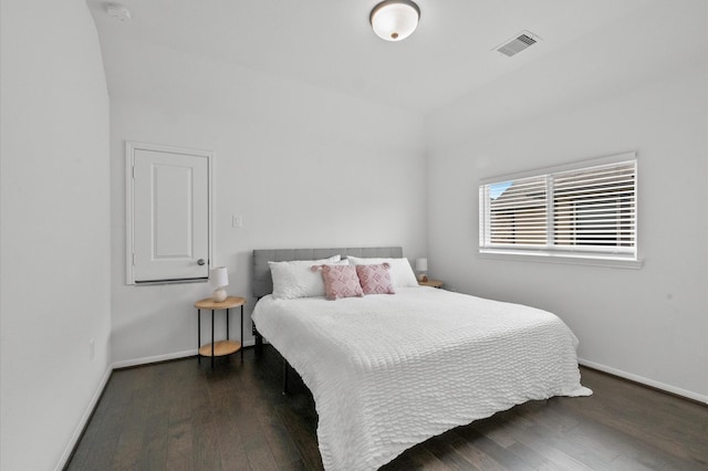 2824 Jehlon Ln, Conroe, TX 77385 - bedroom featuring wood finished floors and baseboards