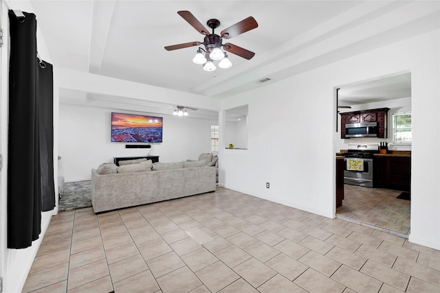 3323 Suiter Way, Pasadena, TX 77503 - living area featuring ceiling fan and light tile patterned floors
