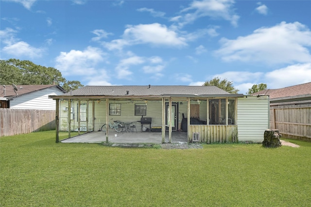 3323 Suiter Way, Pasadena, TX 77503 - rear view of house with a patio area and a sunroom