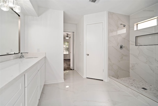 6719 Brittany Park Ln, Houston, TX 77066 - full bath with plenty of natural light, marble tiled flooring, a marble finish shower, and vanity