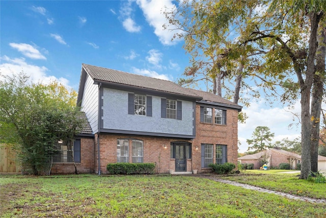 6719 Brittany Park Ln, Houston, TX 77066 - traditional home featuring a front yard and brick siding