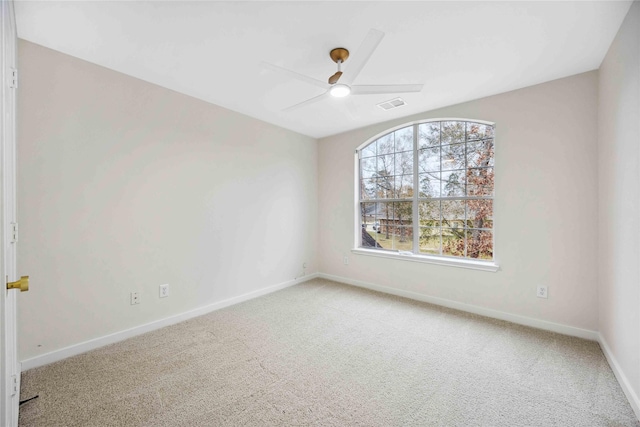 1910 Shark Ct, Crosby, TX 77532 - carpeted spare room featuring baseboards and a ceiling fan