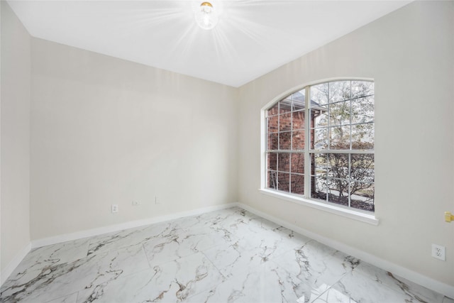 1910 Shark Ct, Crosby, TX 77532 - unfurnished room with baseboards and light marble finish flooring