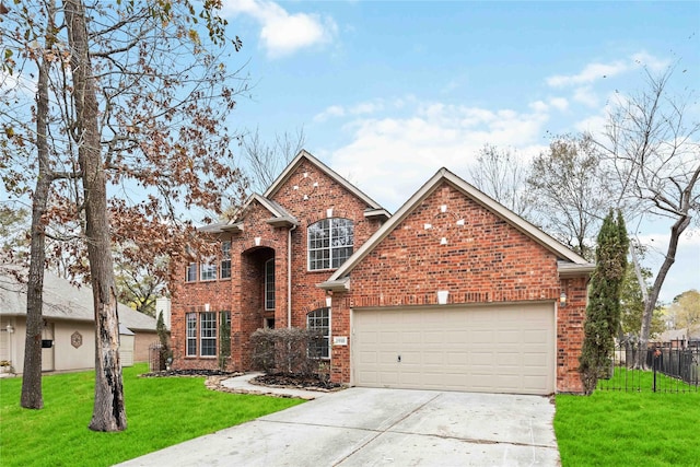 1910 Shark Ct, Crosby, TX 77532 - traditional home with driveway, an attached garage, and brick siding