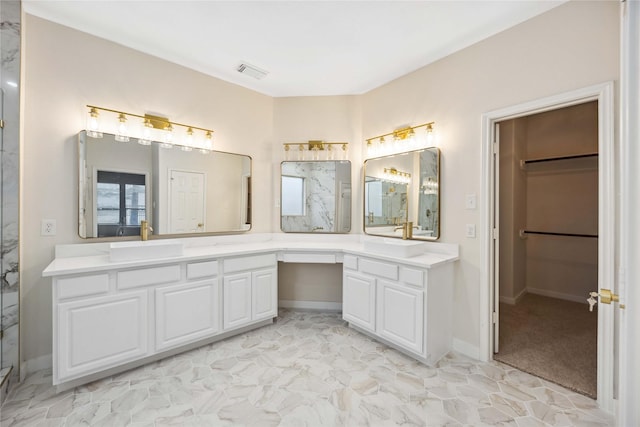 1910 Shark Ct, Crosby, TX 77532 - full bath featuring a marble finish shower, double vanity, baseboards, and a spacious closet