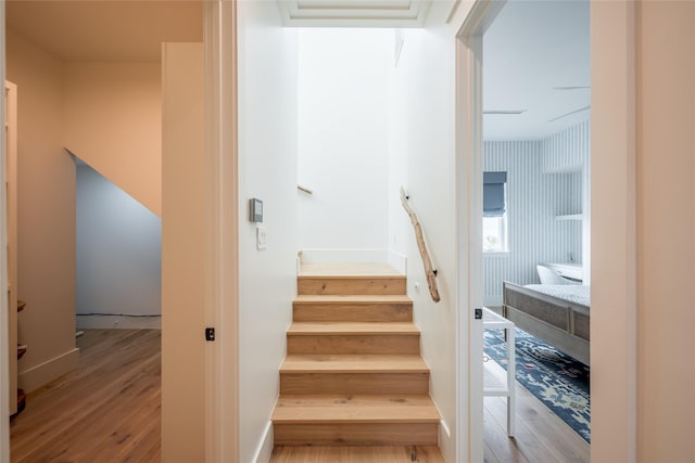 1311 Oahu Dr, Tiki Island, TX 77554 - stairs with wood finished floors
