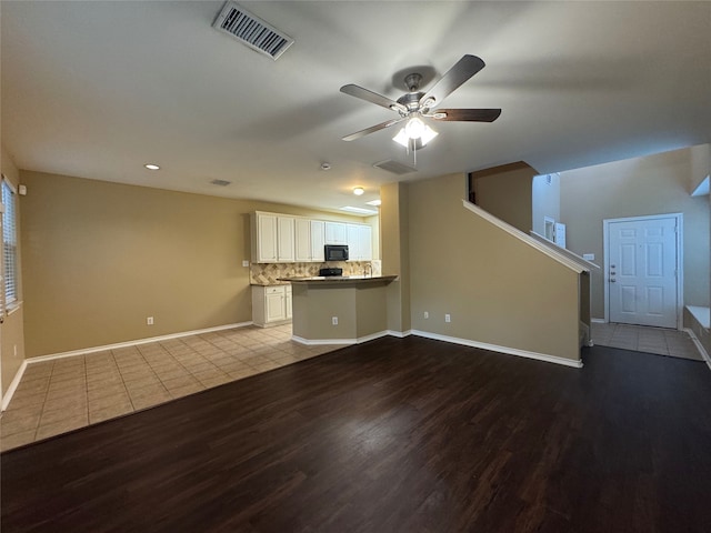 118 N Camellia Grove Cir, The Woodlands, TX 77382 - unfurnished living room featuring wood finished floors, ceiling fan, baseboards, and recessed lighting