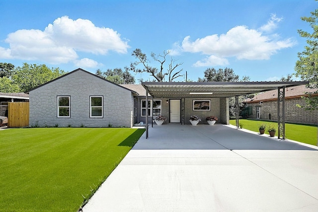 5614 Northridge Dr, Houston, TX 77033 - ranch-style house with driveway, stone siding, and an attached carport