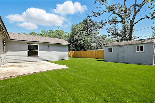 5614 Northridge Dr, Houston, TX 77033 - view of yard with a patio, a storage unit, and an outdoor structure