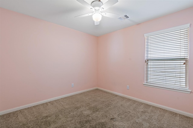11020 Panther Ct, Houston, TX 77099 - spare room featuring carpet, ceiling fan, and baseboards