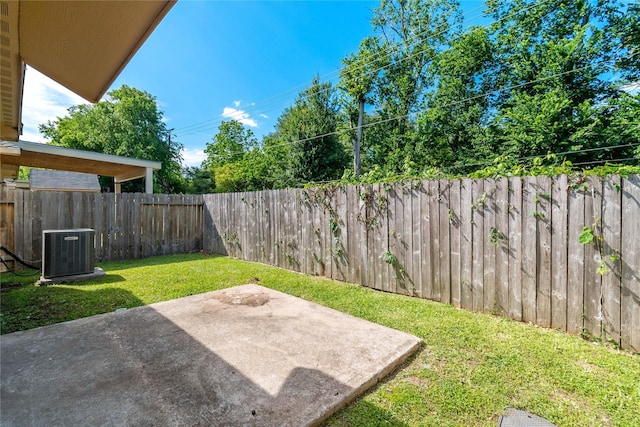 11020 Panther Ct, Houston, TX 77099 - view of yard featuring a patio and central AC