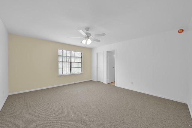9850 Pagewood Ln Unit 1208, Houston, TX 77042 - spare room with light carpet, a ceiling fan, and baseboards