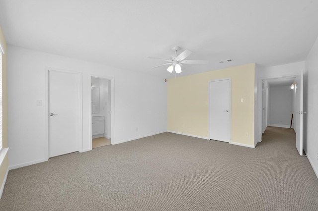 9850 Pagewood Ln Unit 1208, Houston, TX 77042 - unfurnished bedroom with carpet flooring, baseboards, and a ceiling fan
