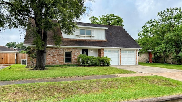 14406 Roundstone Ln, Houston, TX 77015 - view of front of property with concrete driveway, brick siding, and an attached garage