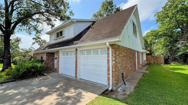 14406 Roundstone Ln, Houston, TX 77015 - view of property exterior with brick siding, driveway, roof with shingles, and a garage