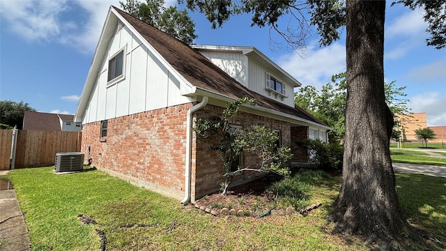 14406 Roundstone Ln, Houston, TX 77015 - view of home's exterior with brick siding and central AC unit