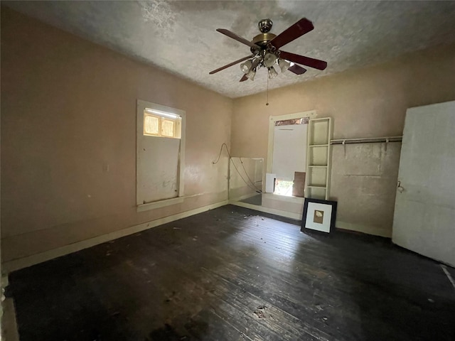 420 4th St, Rosenberg, TX 77471 - spare room featuring hardwood / wood-style floors, ceiling fan, and baseboards