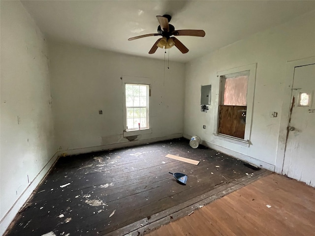 420 4th St, Rosenberg, TX 77471 - empty room with wood finished floors, a ceiling fan, and electric panel