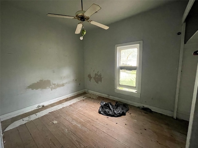 420 4th St, Rosenberg, TX 77471 - unfurnished room featuring hardwood / wood-style floors, ceiling fan, and baseboards