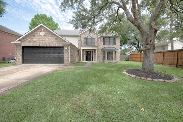 2030 Cutter Dr, League City, TX 77573 - traditional-style house featuring brick siding, central air condition unit, concrete driveway, and a garage
