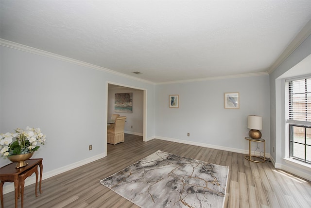 2030 Cutter Dr, League City, TX 77573 - sitting room featuring wood finished floors, ornamental molding, and baseboards