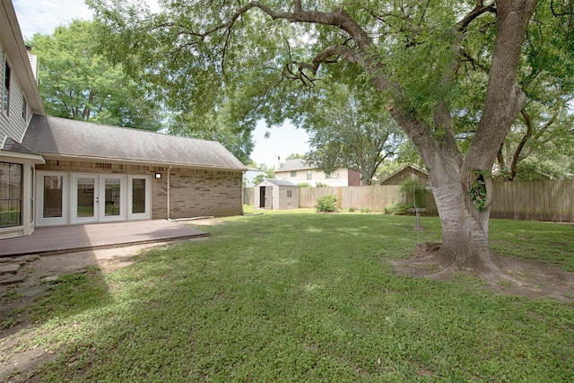 2030 Cutter Dr, League City, TX 77573 - view of yard with french doors, a storage shed, and an outdoor structure