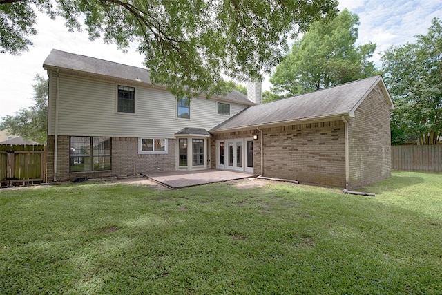 2030 Cutter Dr, League City, TX 77573 - back of house with french doors, brick siding, a chimney, and a wooden deck