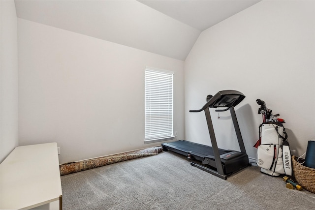 workout room with carpet and lofted ceiling