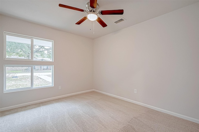 103 Anna St, Tomball, TX 77375 - empty room featuring carpet floors, baseboards, and ceiling fan