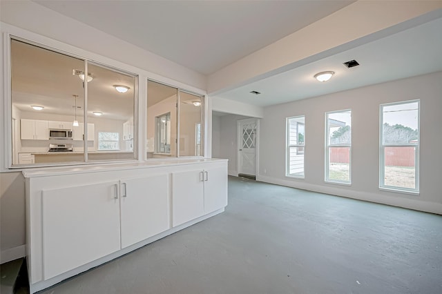 103 Anna St, Tomball, TX 77375 - unfurnished room featuring concrete flooring