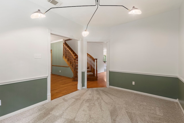 19906 Bayberry Creek Dr, Magnolia, TX 77355 - carpeted spare room with stairs, baseboards, and wood finished floors