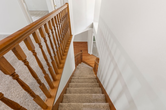 19906 Bayberry Creek Dr, Magnolia, TX 77355 - stairway featuring wood finished floors