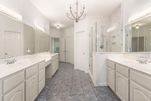 19906 Bayberry Creek Dr, Magnolia, TX 77355 - bathroom with a stall shower, two vanities, and a chandelier