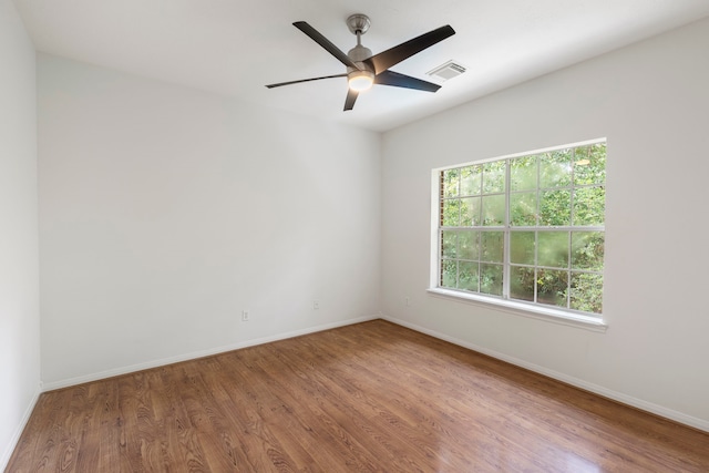 19906 Bayberry Creek Dr, Magnolia, TX 77355 - unfurnished room featuring wood finished floors, baseboards, and ceiling fan