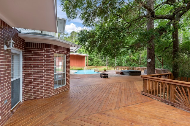 19906 Bayberry Creek Dr, Magnolia, TX 77355 - wooden deck with an outdoor fire pit and an outdoor pool